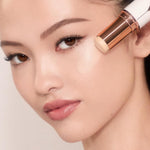 Charlotte Tilbury Unreal Skin Tint application on face