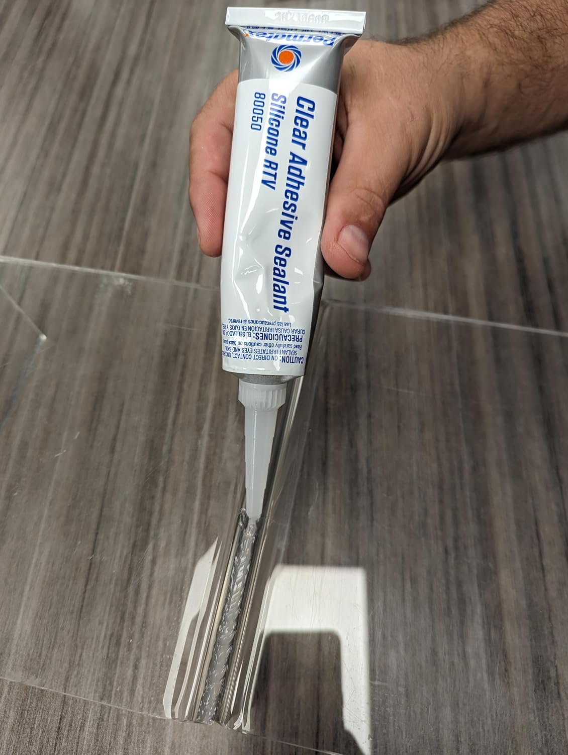 Close up of clear RTV silicone bead texture and transparency