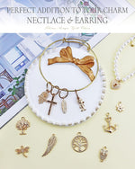 Close up view of alloy gold charms with loop attachments