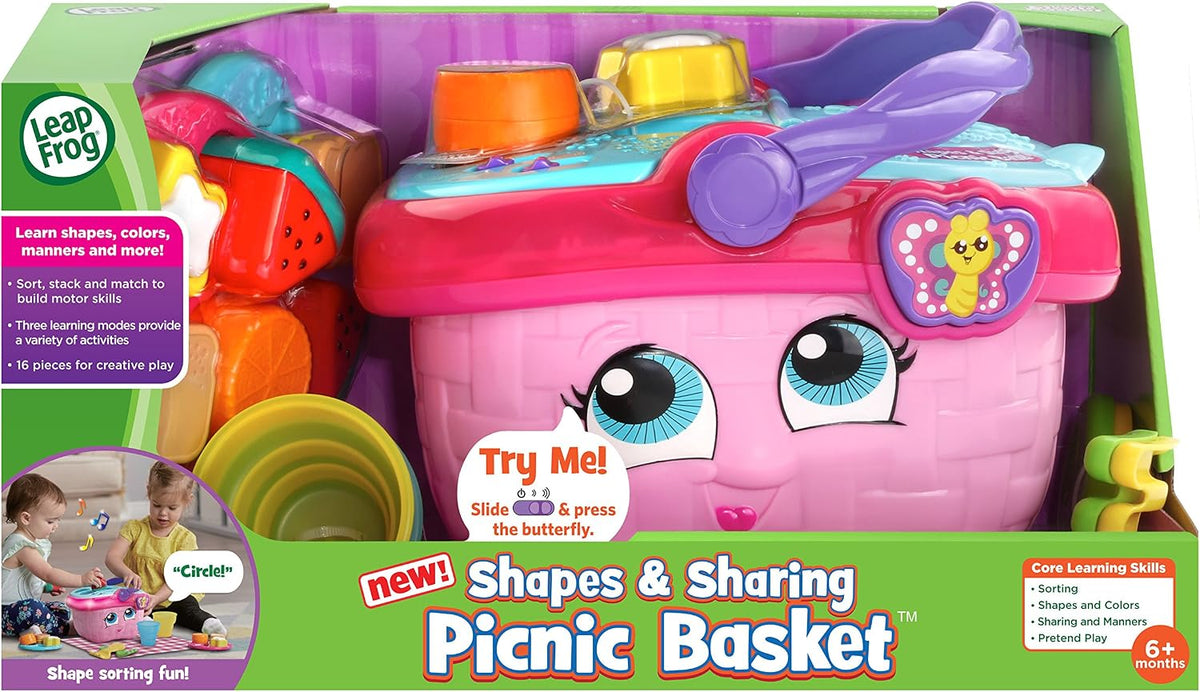 LeapFrog picnic basket set arranged on tablecloth