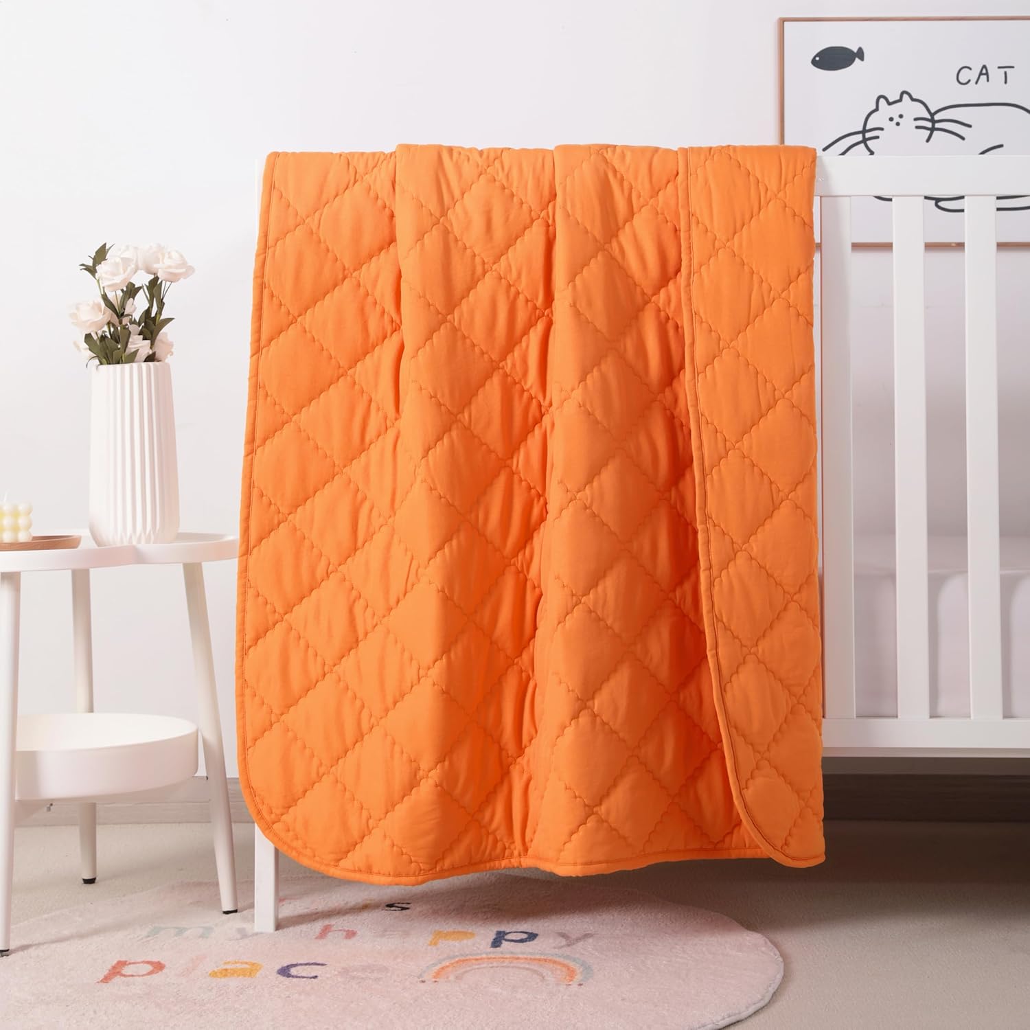 FLXXIE down alternative oversized toddler comforter front view showing the vibrant orange quilted microfiber material.