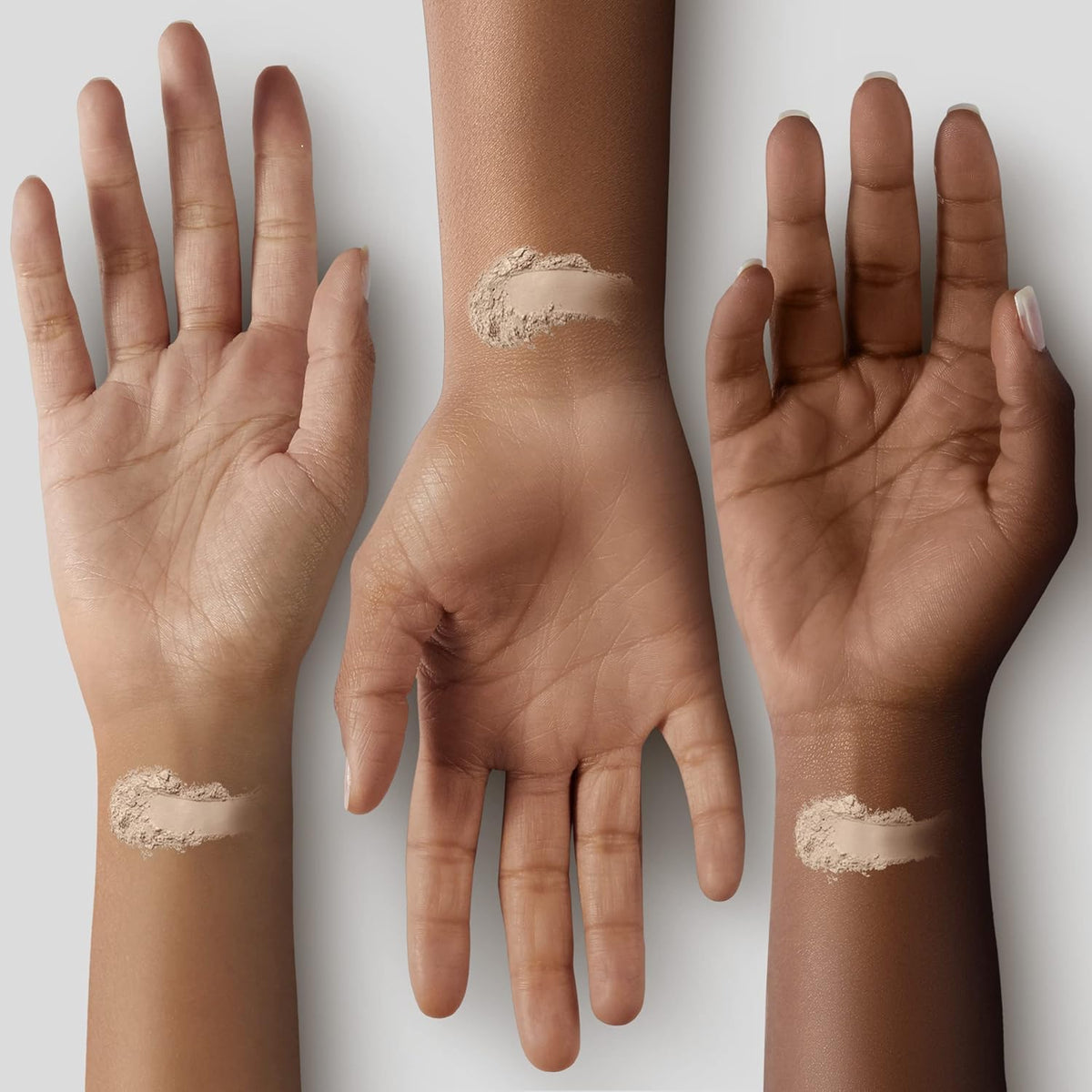 MAC Studio Fix Powder Plus Foundation texture swatch for medium skin tone