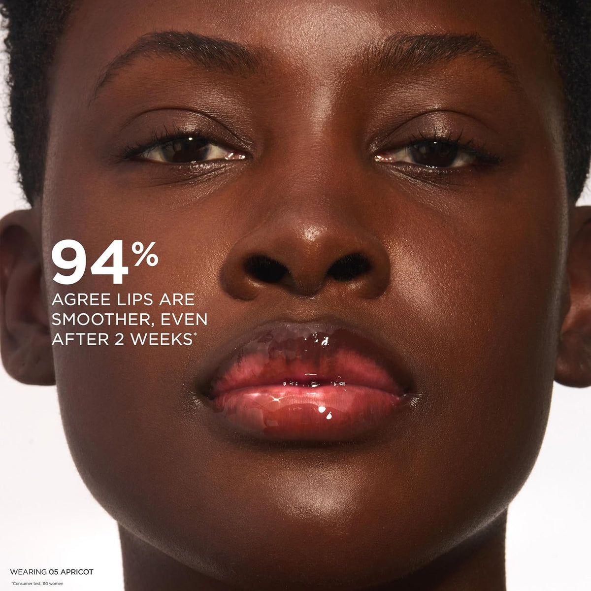 Clarins Lip Comfort Oil lifestyle application shot