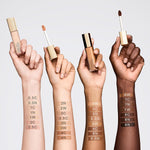 Estee Lauder Double Wear liquid cosmetic concealer bottle cap unscrewed showcasing wand mechanism