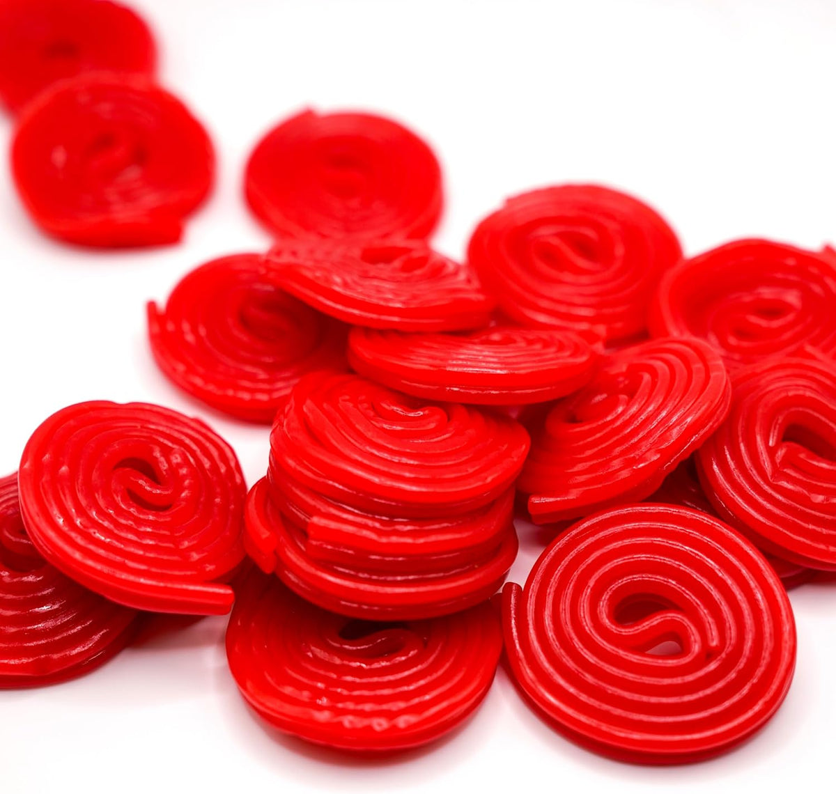 Back label of DM Sweets strawberry licorice wheels showing ingredients and nutrition facts.