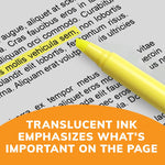 BIC highlighter marking text on a study notebook page