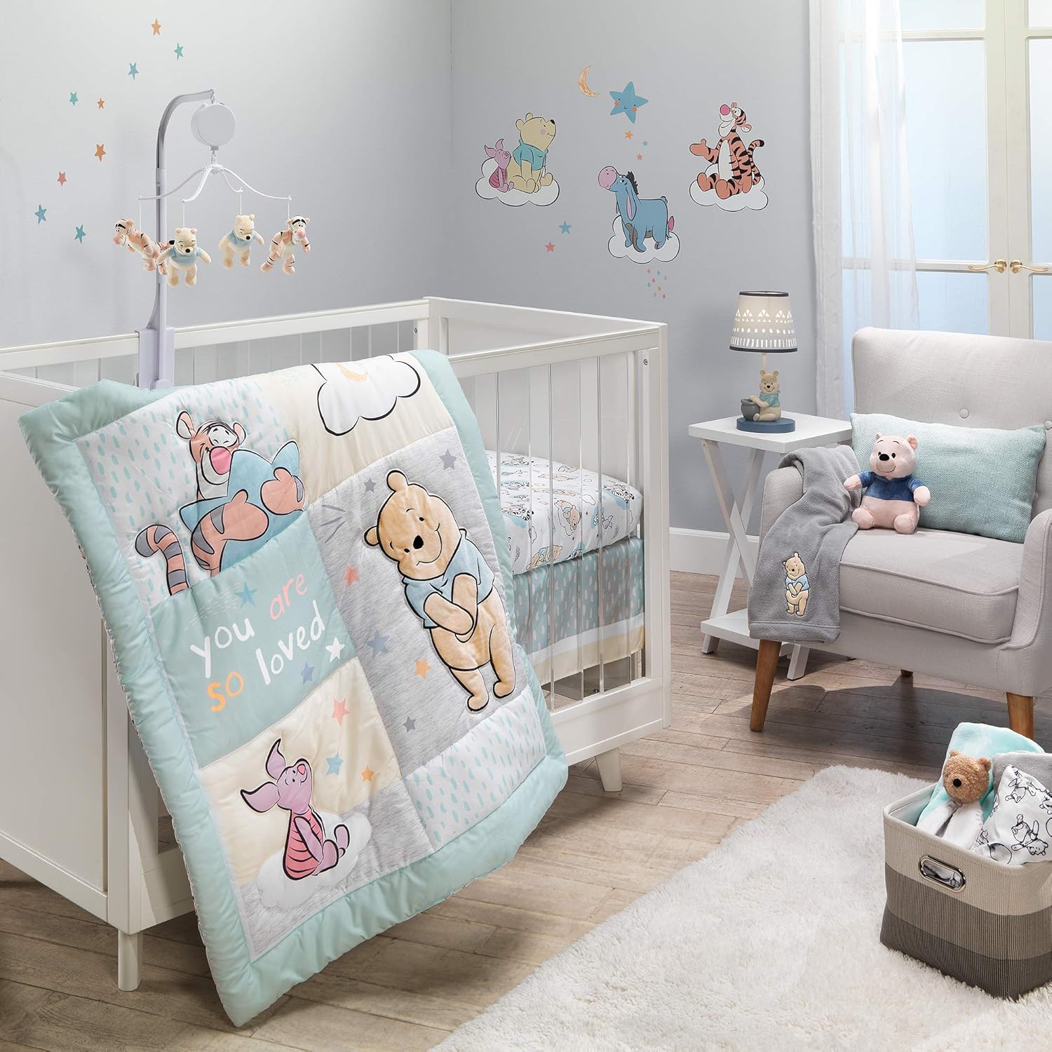 Lambs & Ivy Disney Baby Winnie The Pooh Hugs 3-Piece Crib Bedding Set front view featuring embroidered quilt sheet and skirt