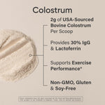 Scooping unflavored bovine colostrum powder into a cold wellness smoothie.
