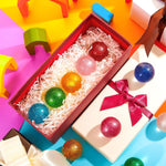 Assorted colorful Shappy bouncy balls arranged in a decorative group