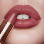 Square-angled tip of Charlotte Tilbury Matte Revolution lipstick for precise application