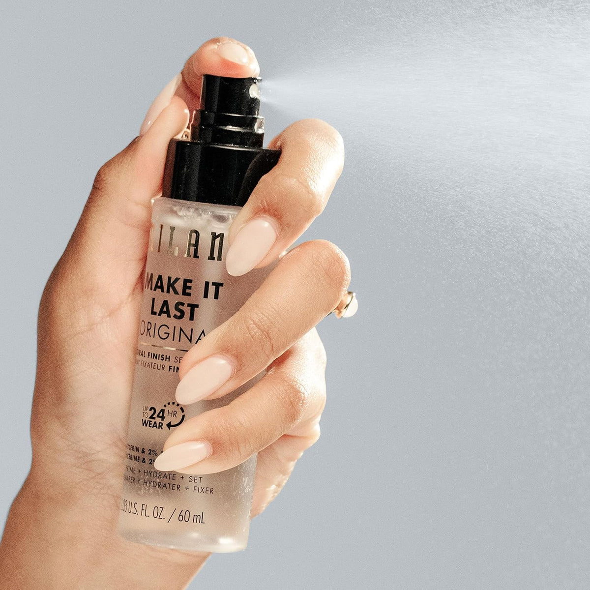 Milani waterproof and sweatproof makeup setting mist application view