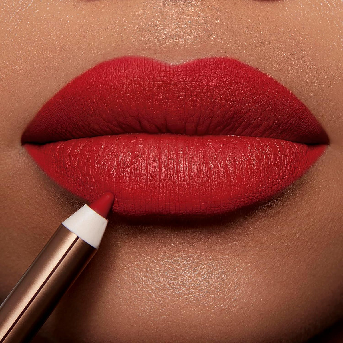 Charlotte Tilbury Lip Cheat swatch on skin