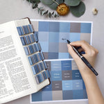 Uzriyl blue Bible tabs set showing Old and New Testament markers