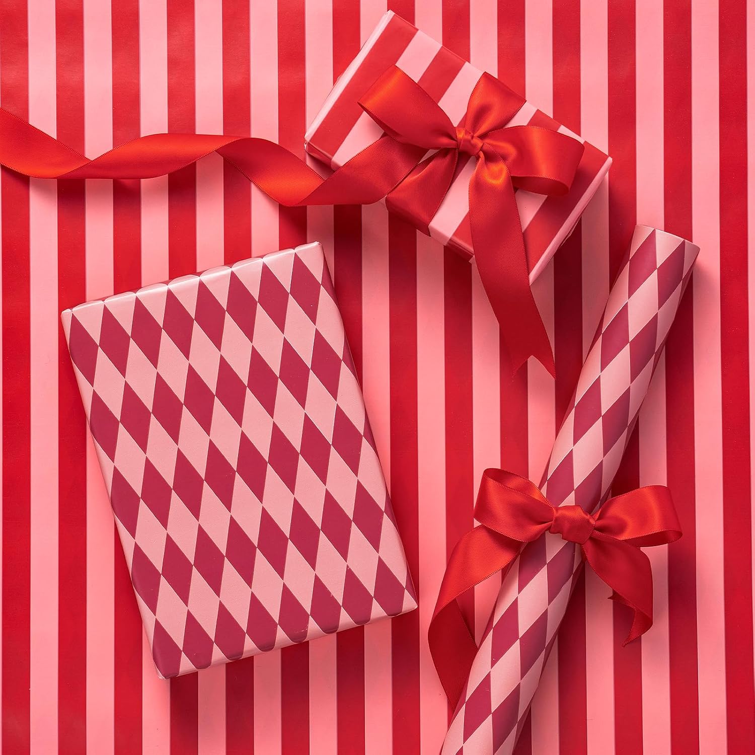 RUSPEPA reversible wrapping paper roll front view displaying red and pink stripes design