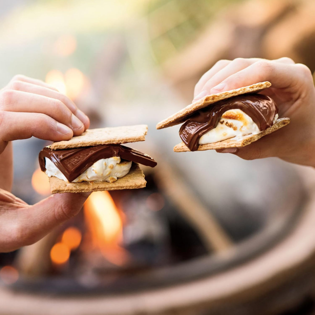 Close up of the creamy texture of an authentic Hershey's milk chocolate square broken in half.
