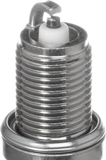 NGK spark plug threaded base and terminal view