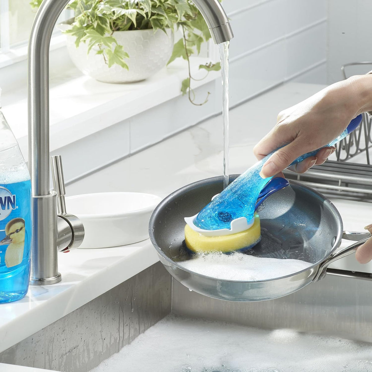 Dawn clear dishwand filled with liquid dish soap for kitchen cleaning
