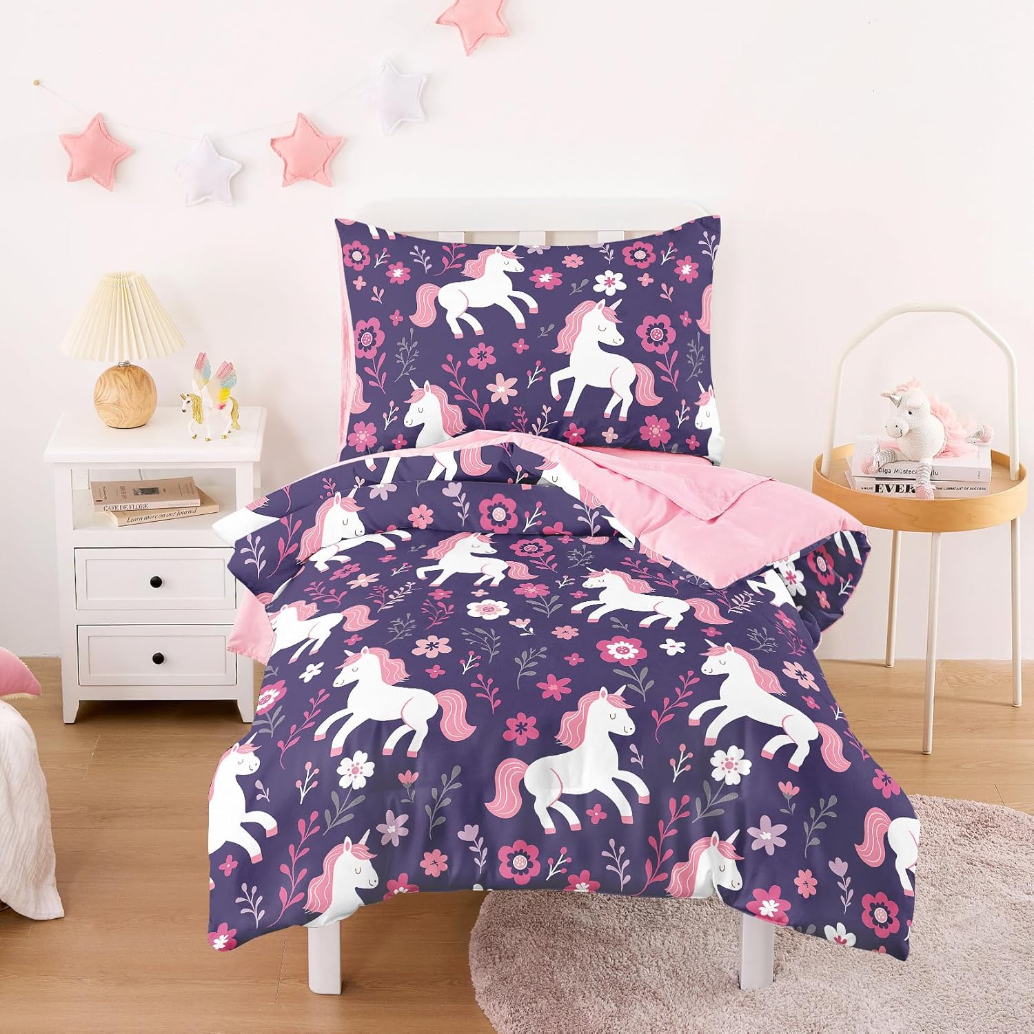 Wake In Cloud toddler bedding set front view showing dark purple unicorn comforter on a crib bed