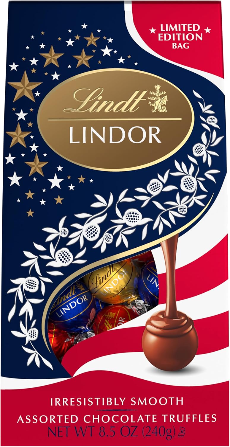 Close up of melting chocolate center in Lindt Lindor truffle