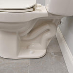 Plumb Pak push on toilet bolt caps installed appearance angle
