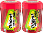Trident Vibes candy coated sugar free gum pieces held in a hand