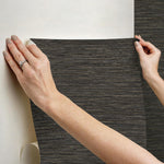 Easy peel and stick application demonstration on smooth wall surface