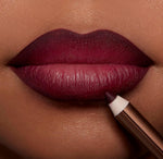 Smudge proof berry shade lip pencil for defining and reshaping lips