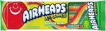 Airheads Rainbow Berry chewy candy strips close up detailing the sweet sour sugar coating.