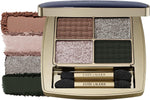 Side view of the slim travel-friendly Estée Lauder gold eyeshadow quad luxury makeup compact