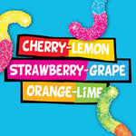 Trolli Mini Sour Brite Crawlers orange lime flavor gummy candy pieces spread out clearly.