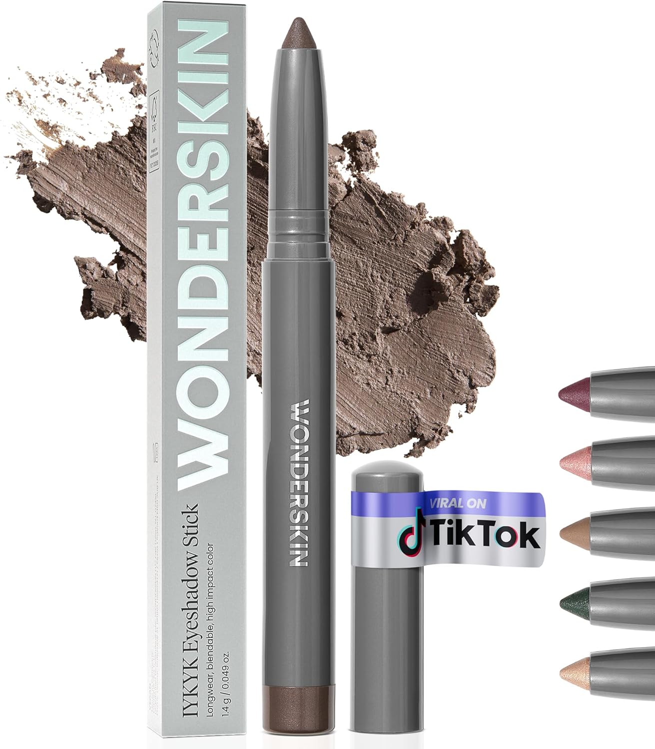 Wonderskin IYKYK Eyeshadow Stick in Ash front view showcasing the silver branded box packaging.