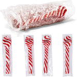 Close up view of gluten free edible candy cane spoons for holiday cocktails