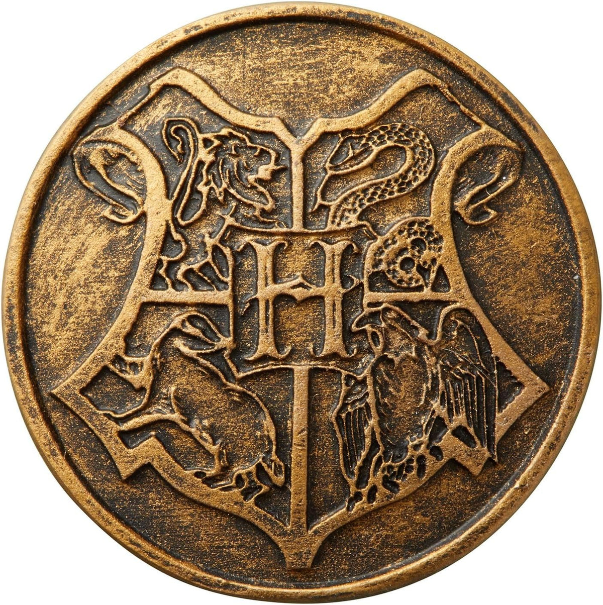 Bronze colored Hogwarts Seal on the exterior base