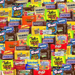 Individually wrapped fun size American chocolate bars spread out on a table