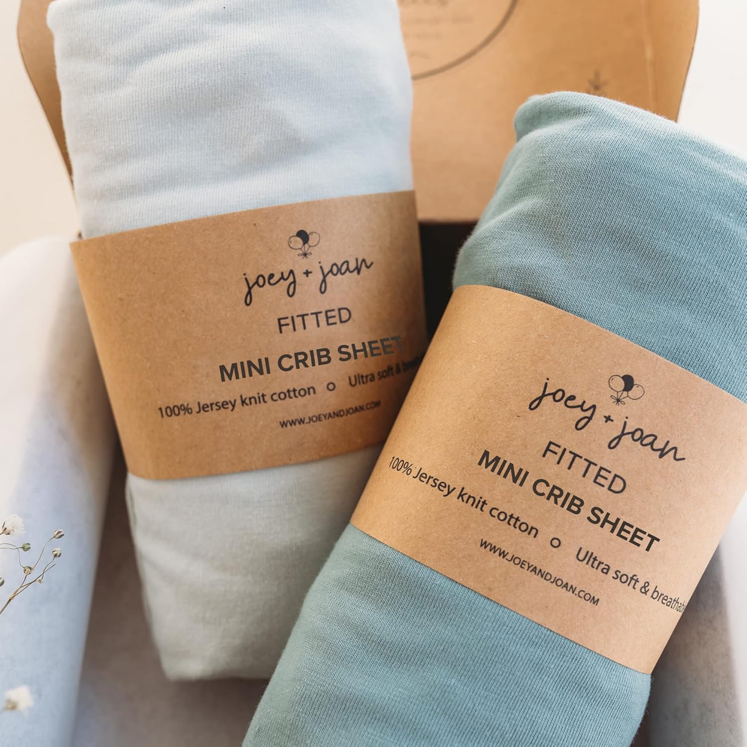Joey + Joan mini portable fitted crib sheets in light and dark sage green
