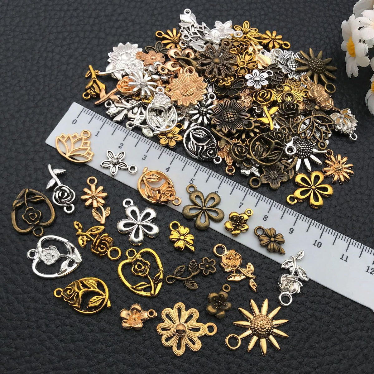 Wocraft metal flower charms arranged for jewelry making