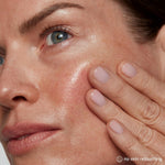 Kate Somerville peptide booster serum showing fluid ounce measurements
