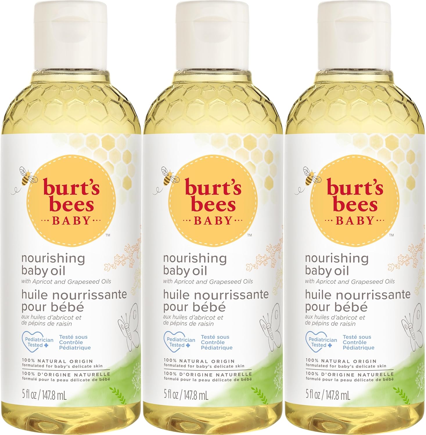 Burt's Bees Baby Nourishing Baby Oil front view of the five ounce bottle showing natural apricot skin care design.