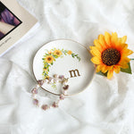 Top-down view of the 4.75 inch round sunflower decorative dish