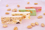 Close-up of individually portioned gourmet soft nougat candies imported by Dropy India.