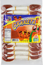 Close up of tamarind and mango fruit paste on plastic spoon