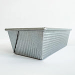 USA Pan 1.5 pound loaf pan top angle showing fluted texture