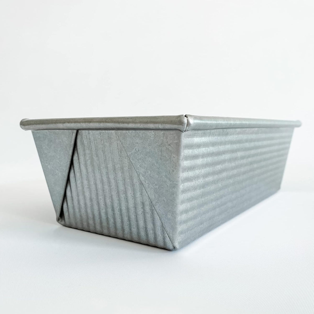 USA Pan 1.5 pound loaf pan top angle showing fluted texture