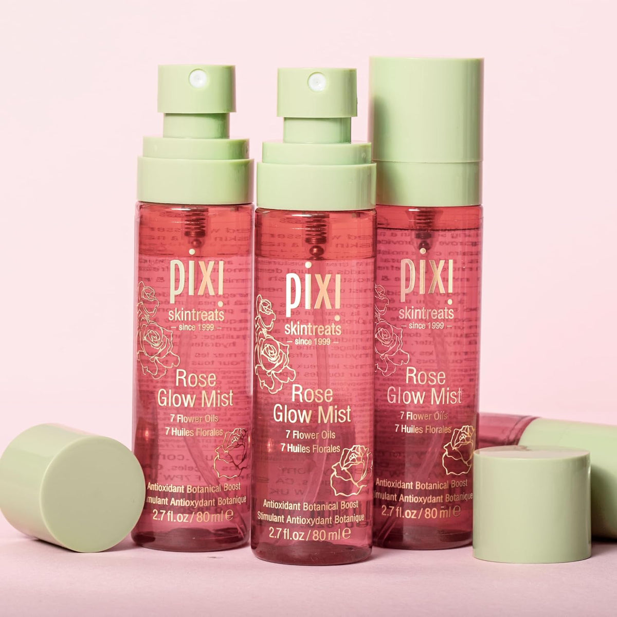 Pixi Rose Glow Mist held in hand for size reference