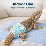 Blue extra small reusable reptile diaper with adjustable straps displayed flat to show sizing details.