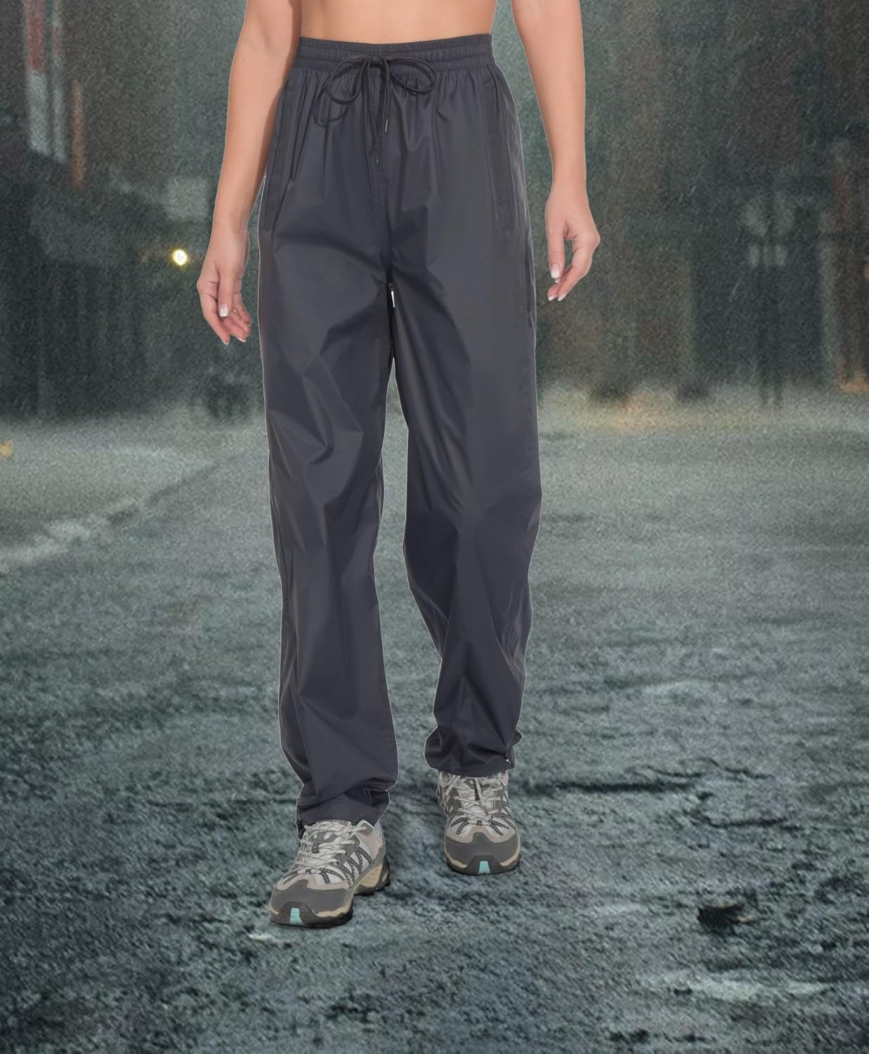 Quechua Women's Packable Rain Pants front view lightweight waterproof hiking trousers