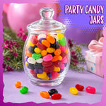 Assorted sweet treats arranged neatly by color for a party dessert buffet display.