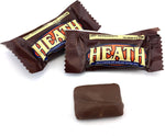 Individually wrapped Heath miniature chocolate toffee bars displayed together on a clean surface.