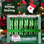 Green and white striped Zestix wintergreen candy canes close up