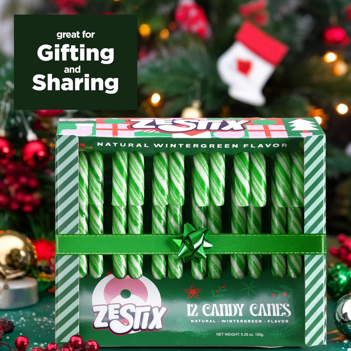 Green and white striped Zestix wintergreen candy canes close up